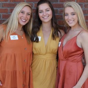 Mustard wrap Lulu’s dress